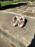 toddler moccasins made by Mvskoke Artist, Soloman Hill