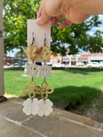 Lasercut Acrylic Earrings made by Johnny Postoak Jr.