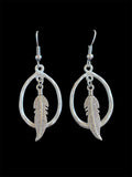 Oval charm earrings made by Alicia Ballard