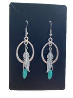 Oval charm earrings made by Alicia Ballard