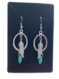 Oval charm earrings made by Alicia Ballard