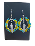 Oval charm earrings made by Alicia Ballard